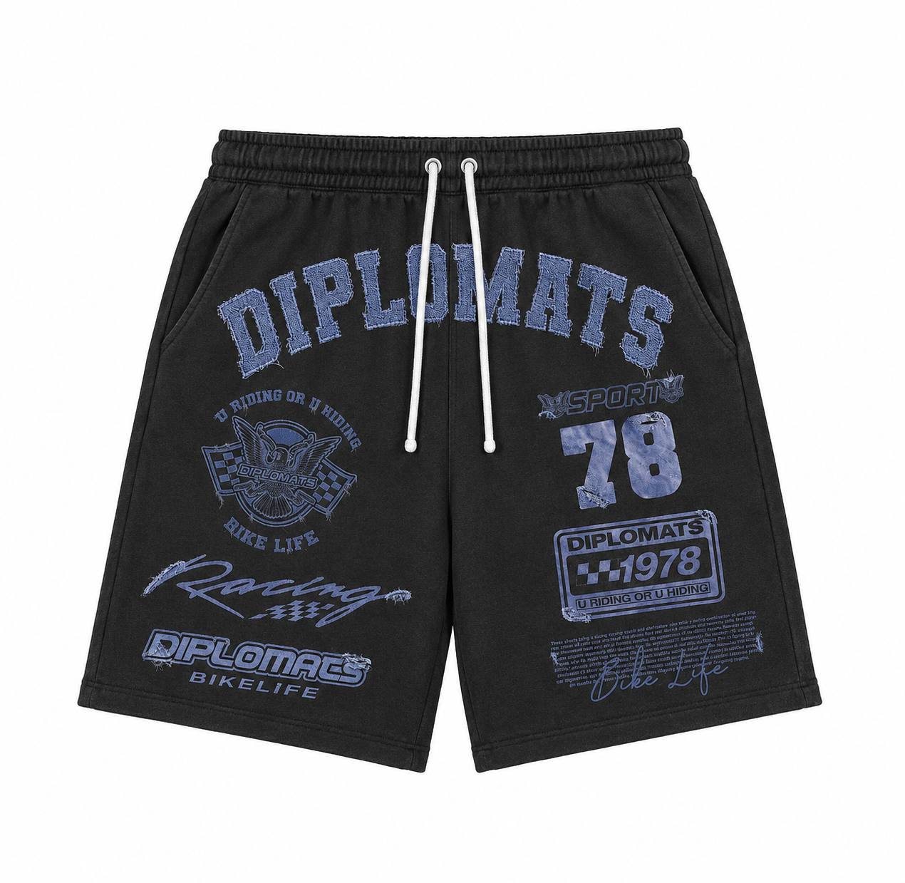 Washed black shorts with Diplomats Bike Life racing graphics and eagle emblem in denim-effect jumbo print across both legs