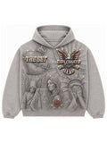 ashed grey Diplomats hoodie front with all-over pavé print of angels, Statue of Liberty, red rose and iced Harlem World eagle crest