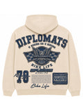 Cream Diplomats Bike Life hoodie back with denim-effect jumbo print, varsity wordmark, winged eagle racing crest and checkered flags