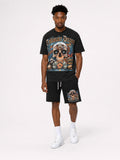 "Man wearing black Trillionaire Dreams Floral Skull matching tee and shorts set with gothic logo and NYC skull graphic"